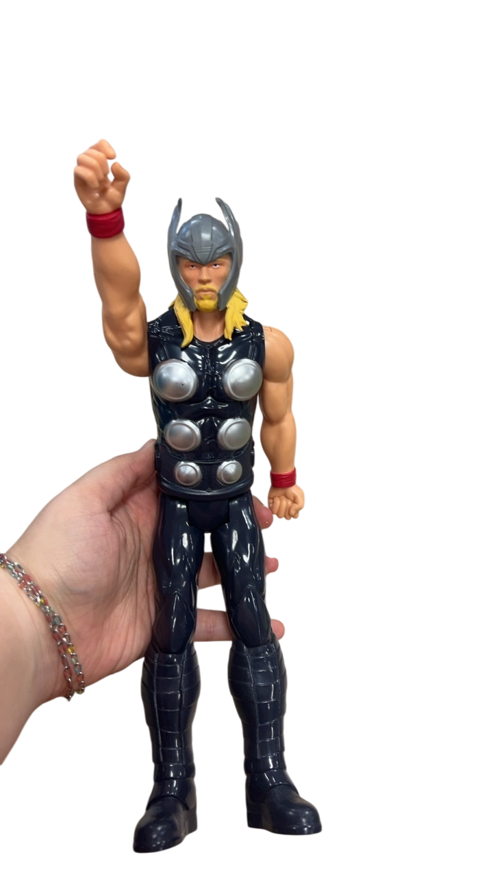 Hasbro Action Figure Black and silver with yellow hair and red wristbands