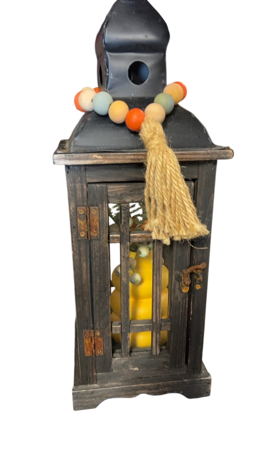 Decorative Item Lantern, beads, and vase