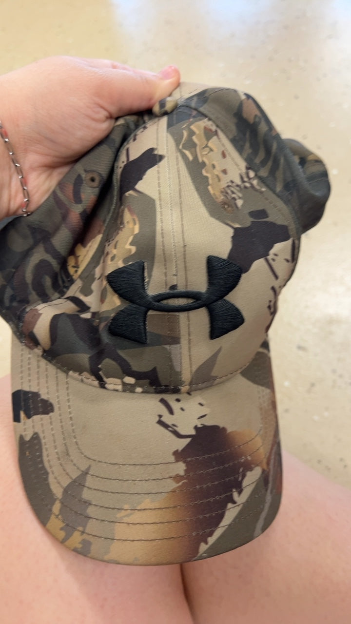 Under Armour Hats Camouflage pattern with shades of green, brown, and black